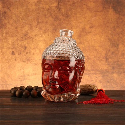 Unique Buddha Face Glass Bottle