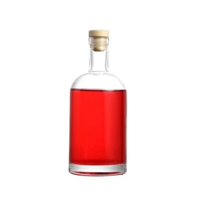 A Transparent Vodka Bottle With A Cork